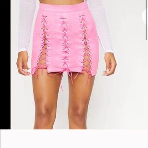 Hot pink faux suede lace up detail mini squirt